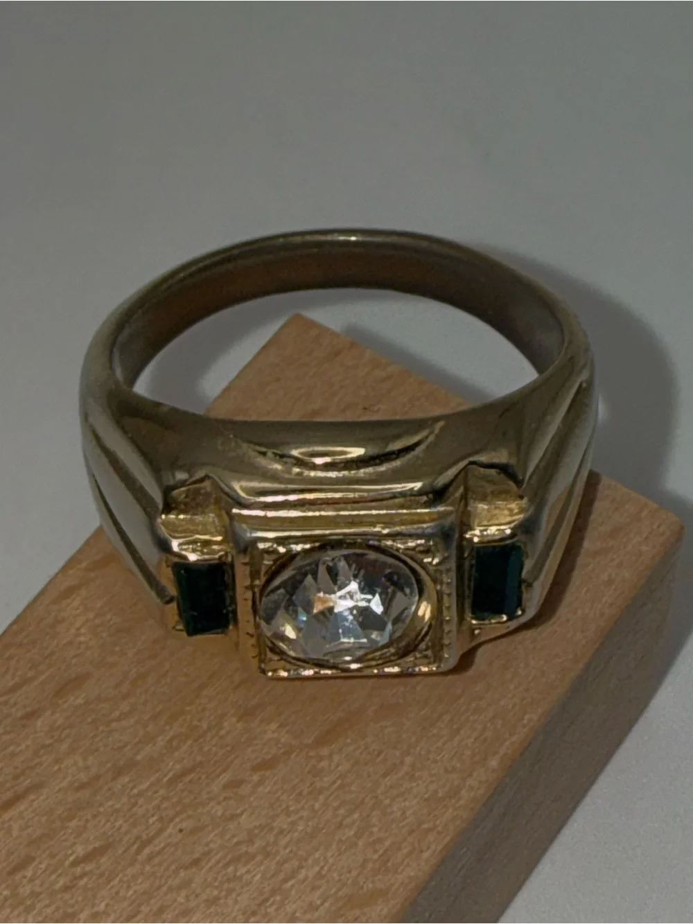 Gold-Tone Men's Signet Ring with Clear Center Stone and Green Accents